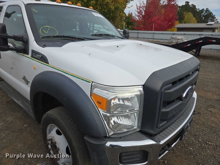 image for item YA1003 2015 Ford F550 Crew Cab flatbed truck