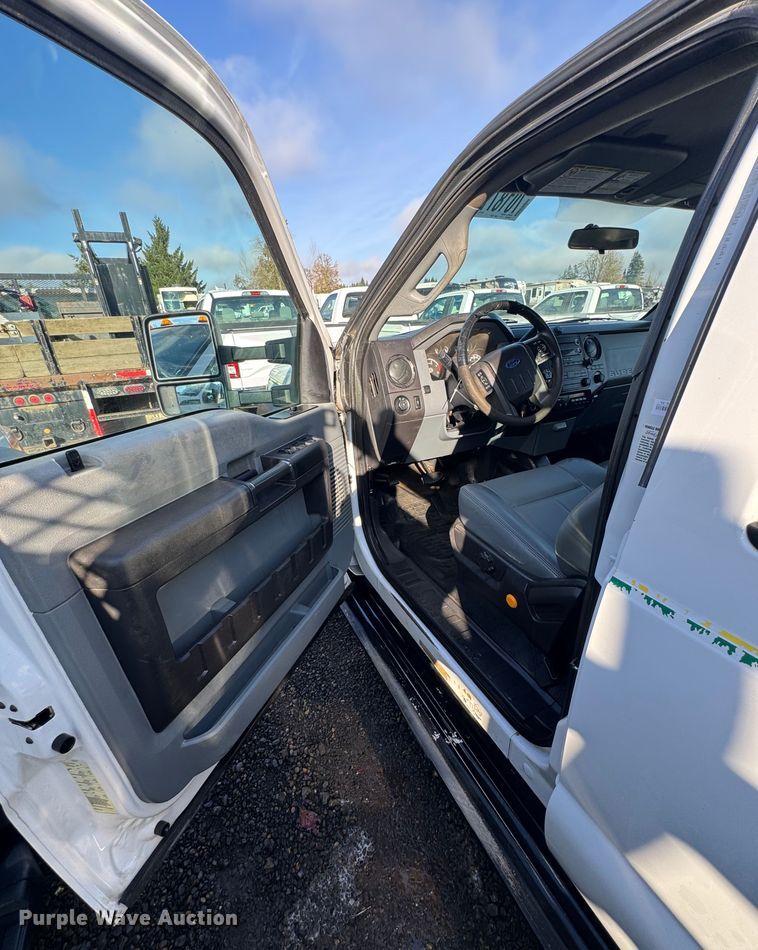 image for item YA1003 2015 Ford F550 Crew Cab flatbed truck