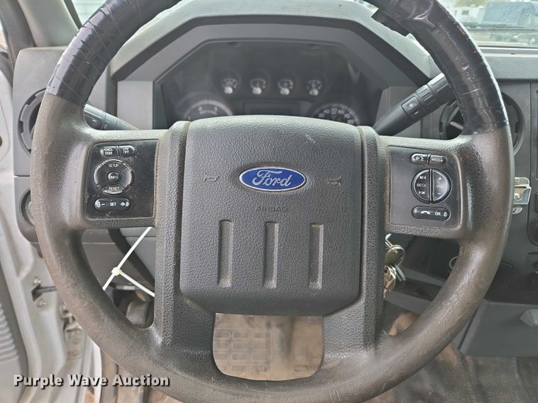 image for item YA1003 2015 Ford F550 Crew Cab flatbed truck