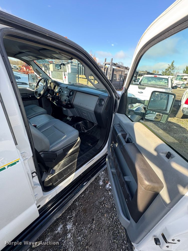 image for item YA1003 2015 Ford F550 Crew Cab flatbed truck