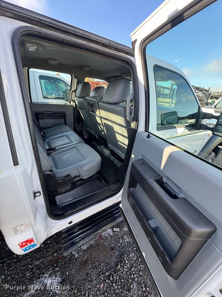 image for item YA1003 2015 Ford F550 Crew Cab flatbed truck