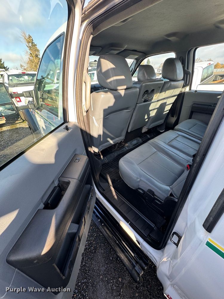 image for item YA1003 2015 Ford F550 Crew Cab flatbed truck