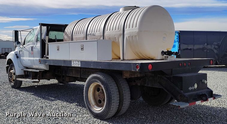 image for item YA1591 2004 Ford  F650 SuperCab flatbed truck