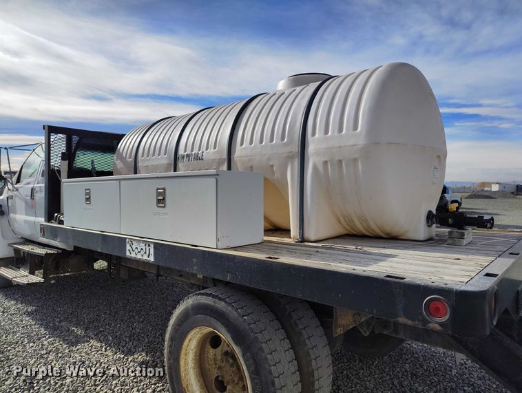 image for item YA1591 2004 Ford  F650 SuperCab flatbed truck