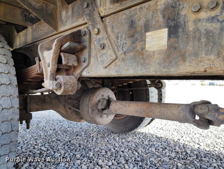 image for item YA1591 2004 Ford  F650 SuperCab flatbed truck