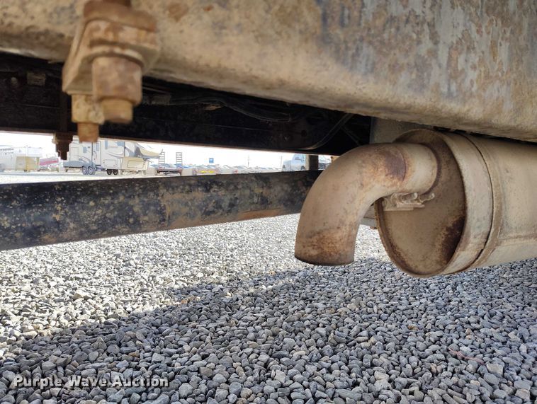 image for item YA1591 2004 Ford  F650 SuperCab flatbed truck