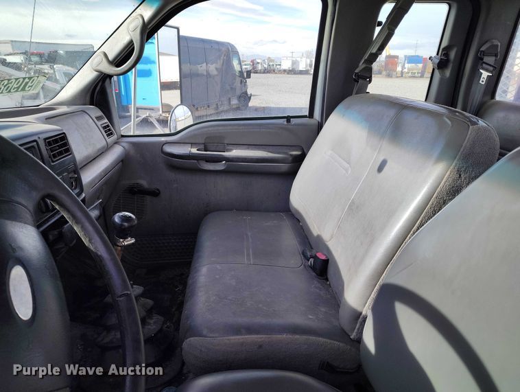 image for item YA1591 2004 Ford  F650 SuperCab flatbed truck