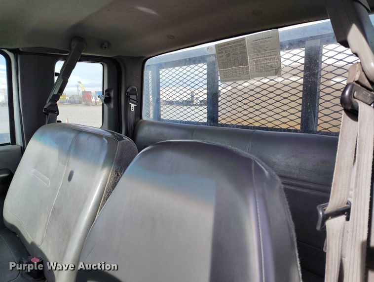 image for item YA1591 2004 Ford  F650 SuperCab flatbed truck