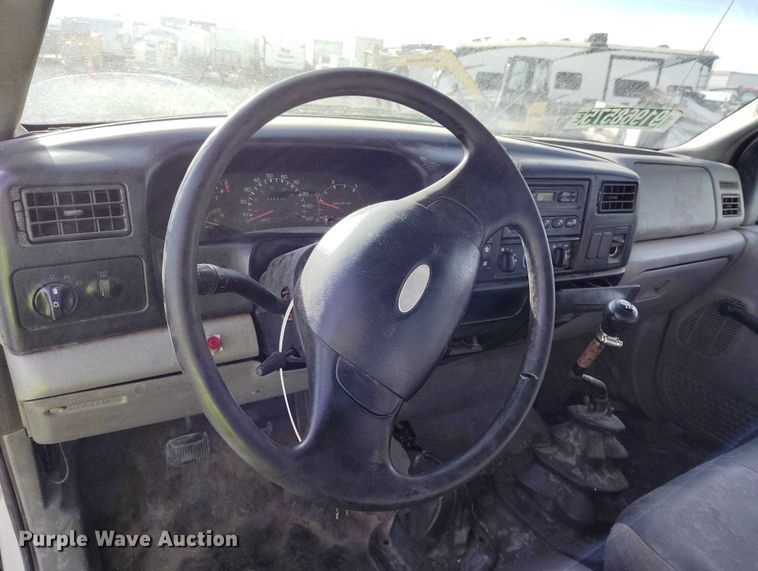 image for item YA1591 2004 Ford  F650 SuperCab flatbed truck