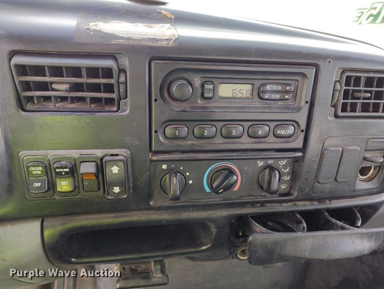 image for item YA1591 2004 Ford  F650 SuperCab flatbed truck