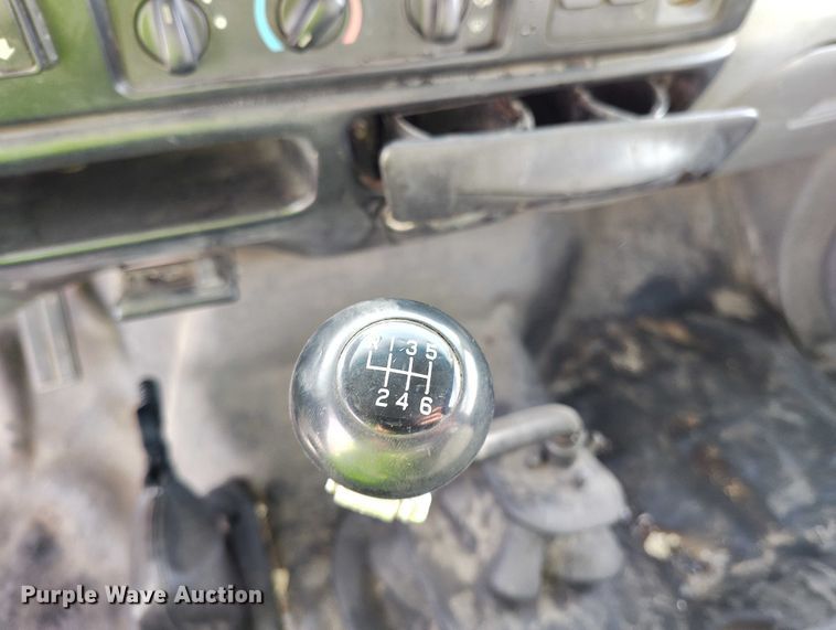 image for item YA1591 2004 Ford  F650 SuperCab flatbed truck