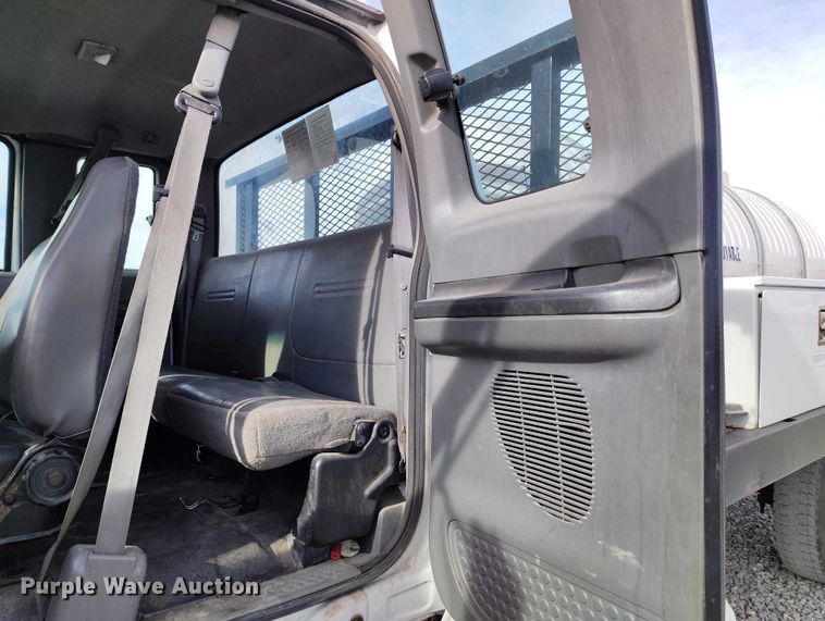 image for item YA1591 2004 Ford  F650 SuperCab flatbed truck