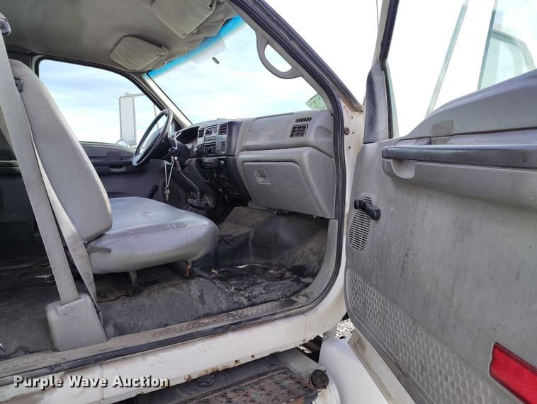 image for item YA1591 2004 Ford  F650 SuperCab flatbed truck