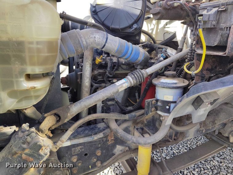 image for item YA1591 2004 Ford  F650 SuperCab flatbed truck