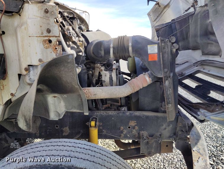 image for item YA1591 2004 Ford  F650 SuperCab flatbed truck