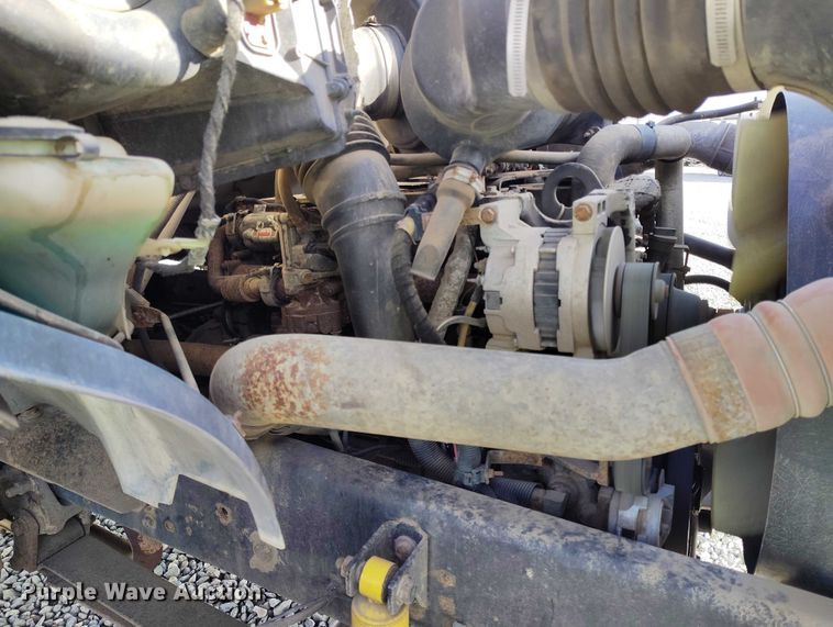 image for item YA1591 2004 Ford  F650 SuperCab flatbed truck