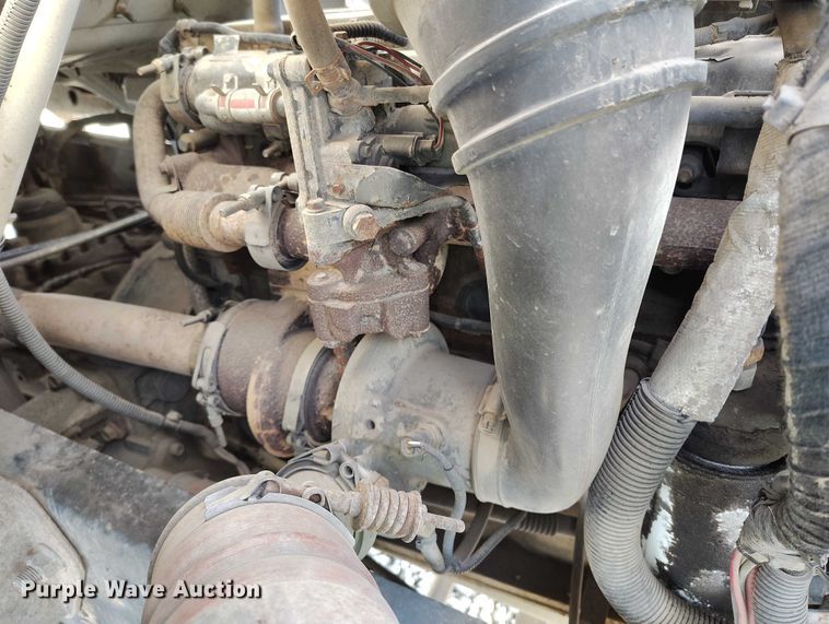 image for item YA1591 2004 Ford  F650 SuperCab flatbed truck