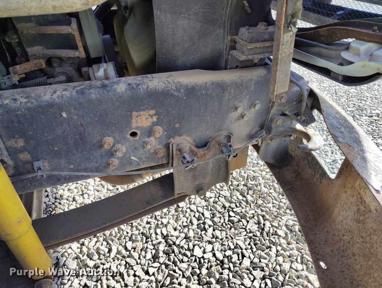 image for item YA1591 2004 Ford  F650 SuperCab flatbed truck