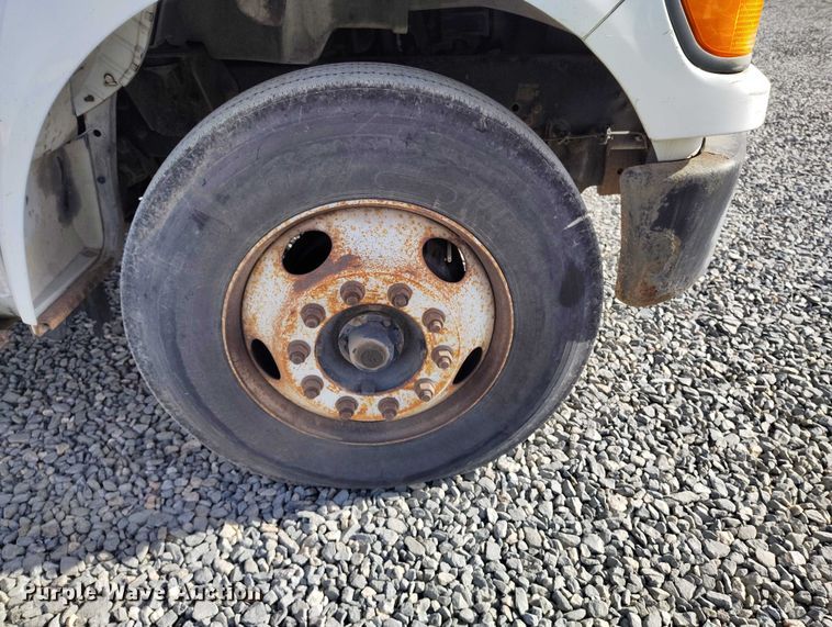 image for item YA1591 2004 Ford  F650 SuperCab flatbed truck