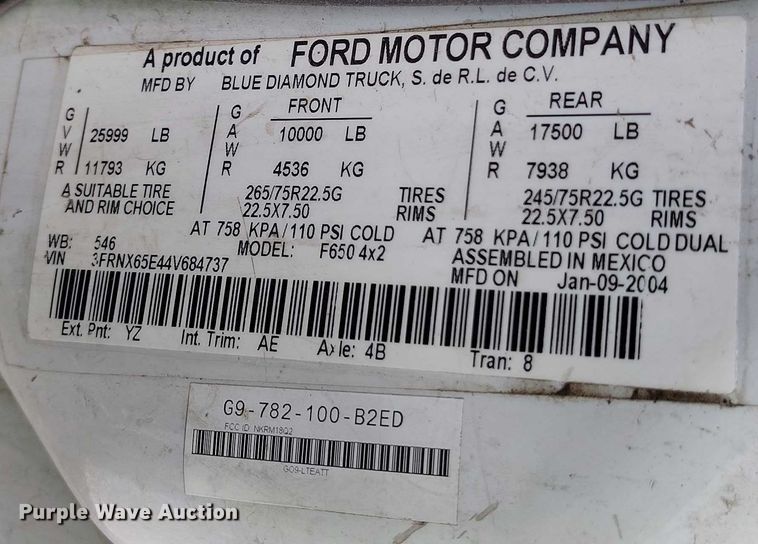 image for item YA1591 2004 Ford  F650 SuperCab flatbed truck