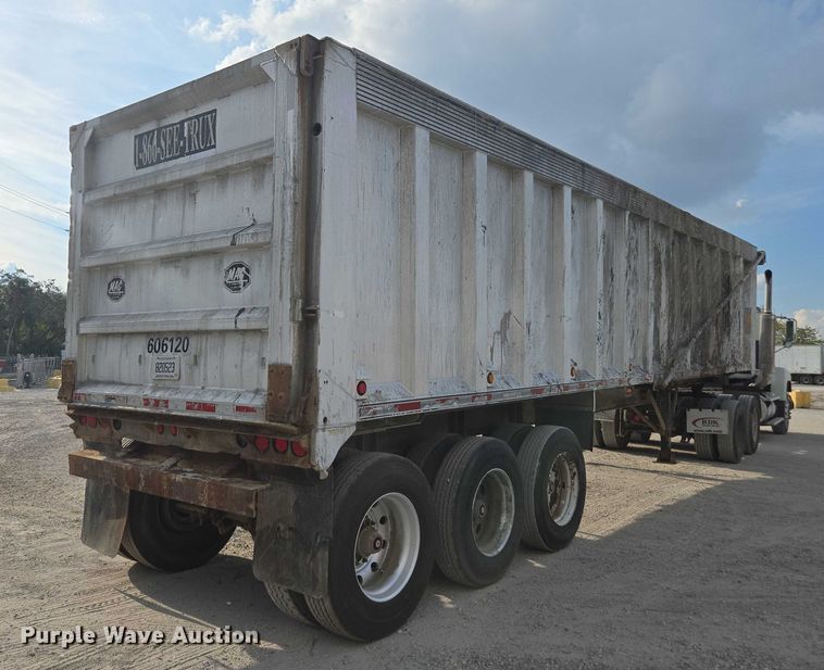 image for item DT4718 2006 Mac end dump trailer