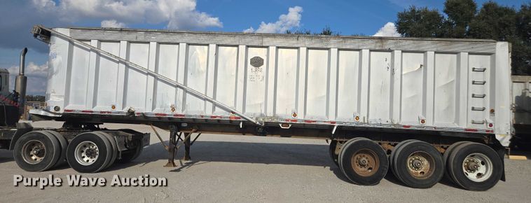 image for item DT4718 2006 Mac end dump trailer