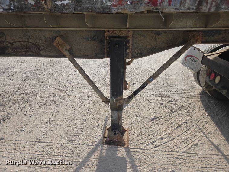 image for item DT4718 2006 Mac end dump trailer