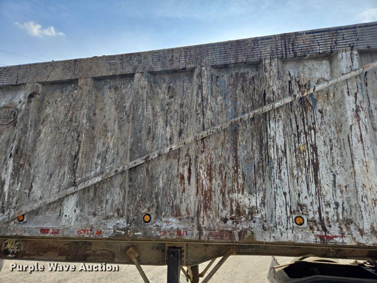 image for item DT4718 2006 Mac end dump trailer