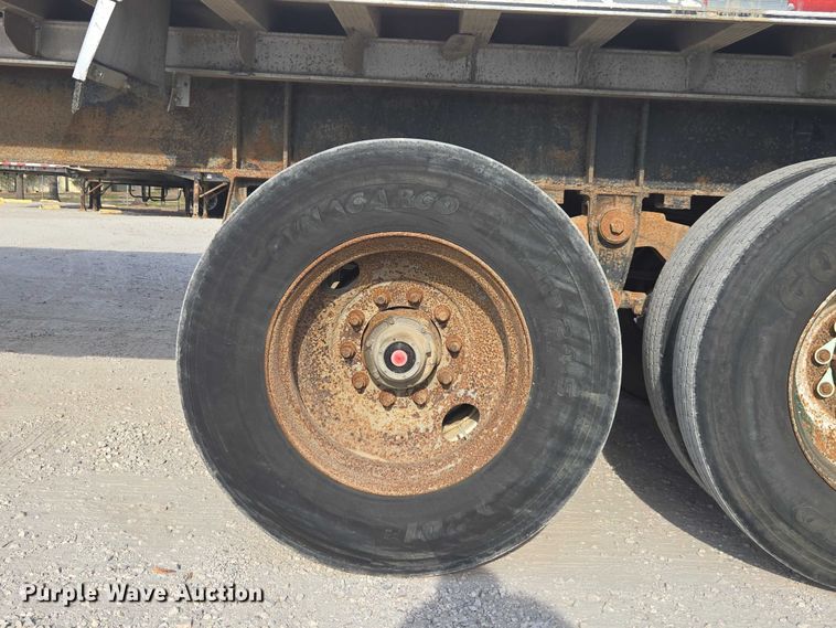 image for item DT4718 2006 Mac end dump trailer