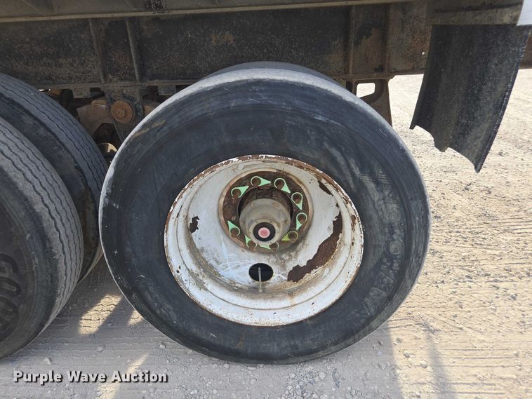 image for item DT4718 2006 Mac end dump trailer