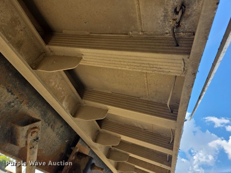 image for item DT4721 2006 Mac end dump trailer