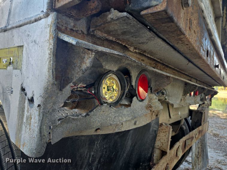 image for item DT4721 2006 Mac end dump trailer