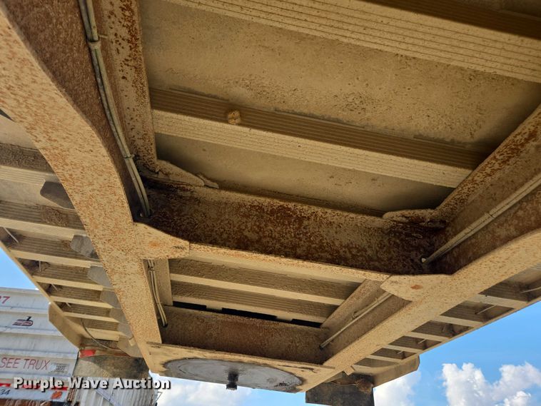 image for item DT4721 2006 Mac end dump trailer