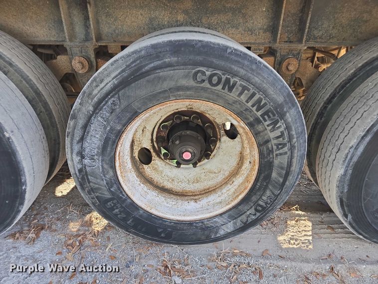 image for item DT4721 2006 Mac end dump trailer