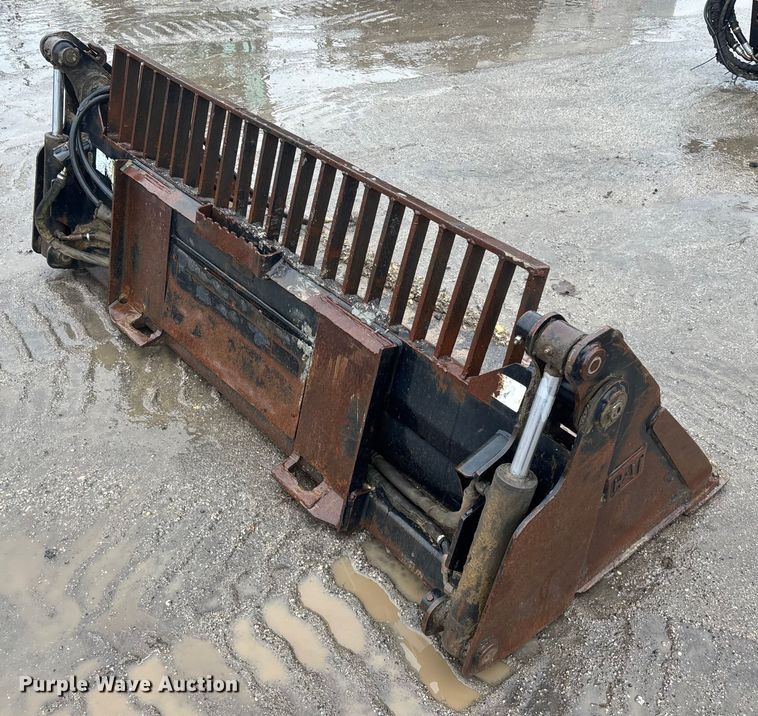 image for item DU0311 Caterpillar skid steer four-in-one bucket