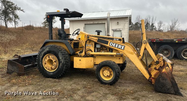 image for item DW4383 1998 John Deere 210LE landscape tractor