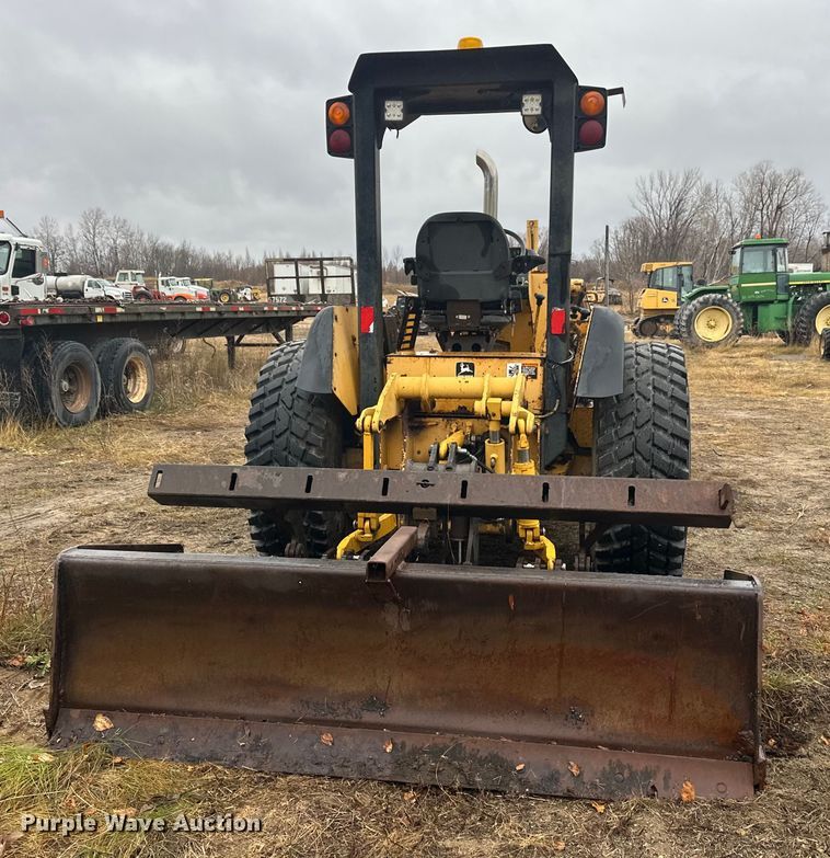 image for item DW4383 1998 John Deere 210LE landscape tractor