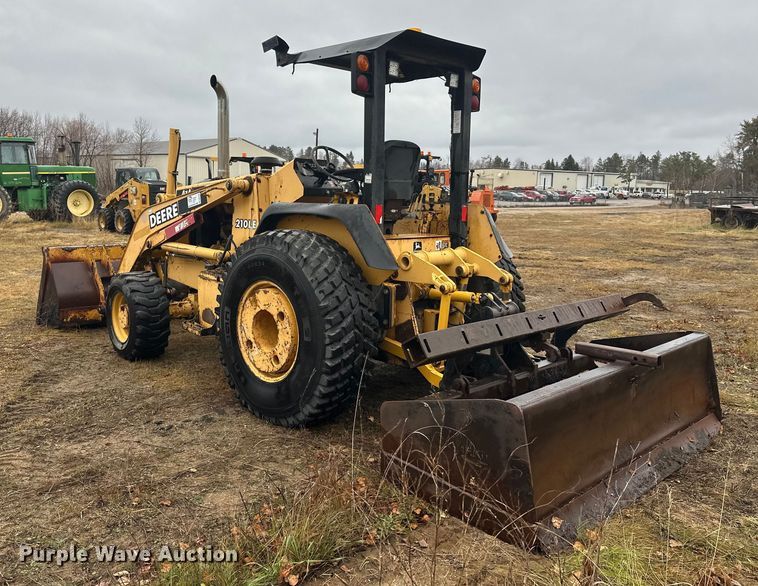 image for item DW4383 1998 John Deere 210LE landscape tractor