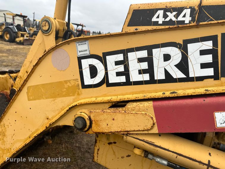 image for item DW4383 1998 John Deere 210LE landscape tractor