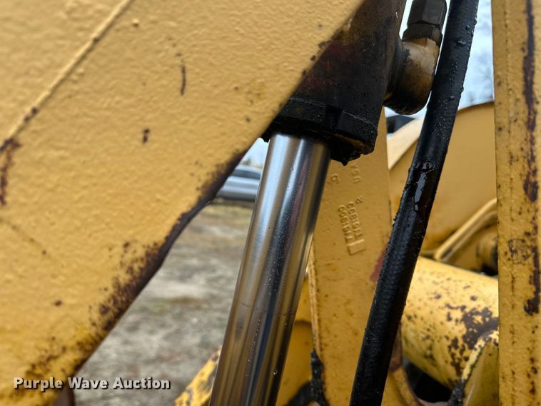 image for item DW4383 1998 John Deere 210LE landscape tractor