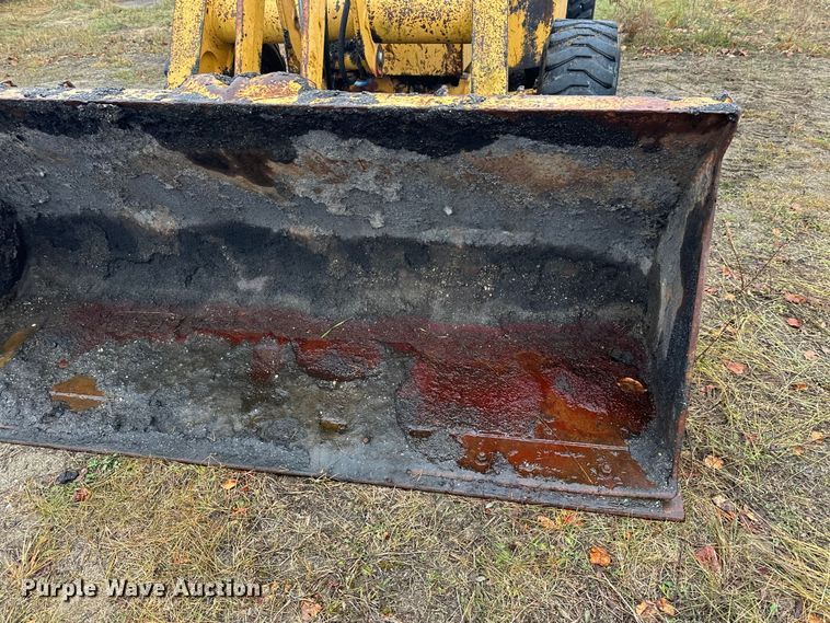 image for item DW4383 1998 John Deere 210LE landscape tractor