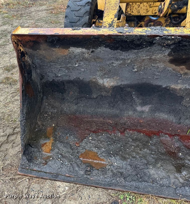 image for item DW4383 1998 John Deere 210LE landscape tractor