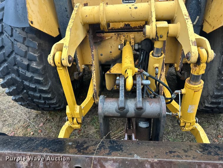 image for item DW4383 1998 John Deere 210LE landscape tractor