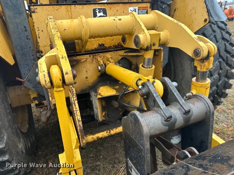 image for item DW4383 1998 John Deere 210LE landscape tractor