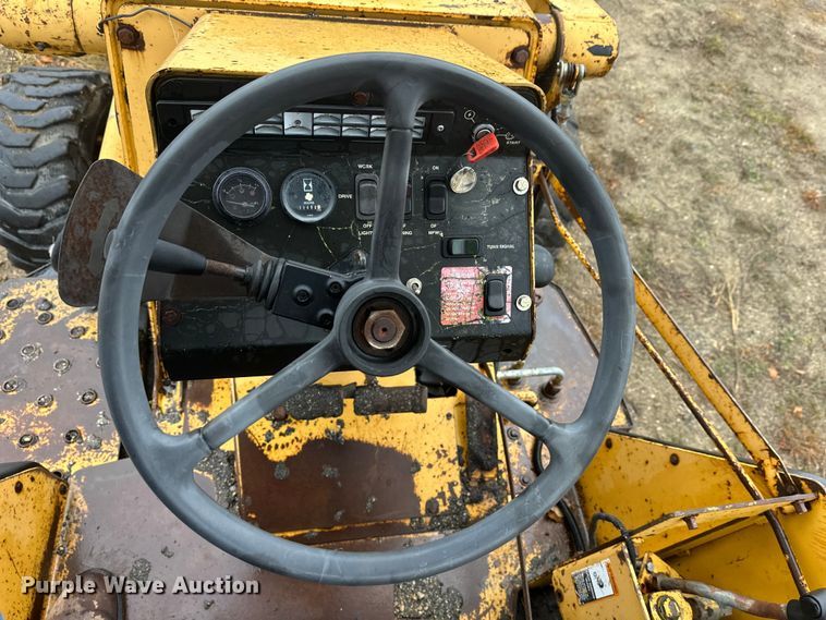 image for item DW4383 1998 John Deere 210LE landscape tractor