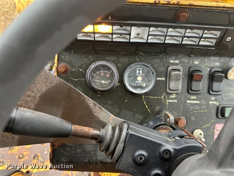 image for item DW4383 1998 John Deere 210LE landscape tractor