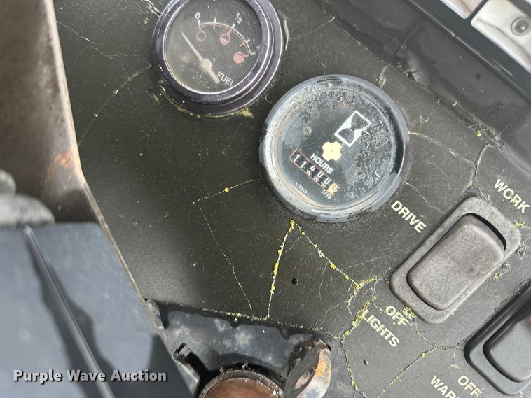 image for item DW4383 1998 John Deere 210LE landscape tractor