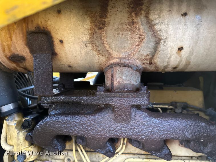 image for item DW4383 1998 John Deere 210LE landscape tractor