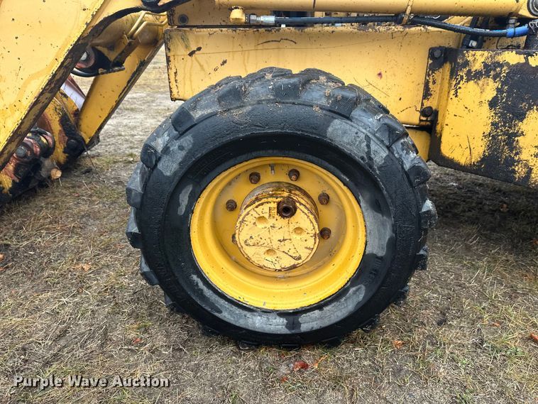 image for item DW4383 1998 John Deere 210LE landscape tractor