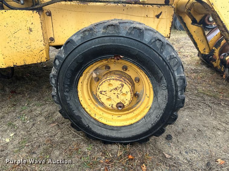 image for item DW4383 1998 John Deere 210LE landscape tractor